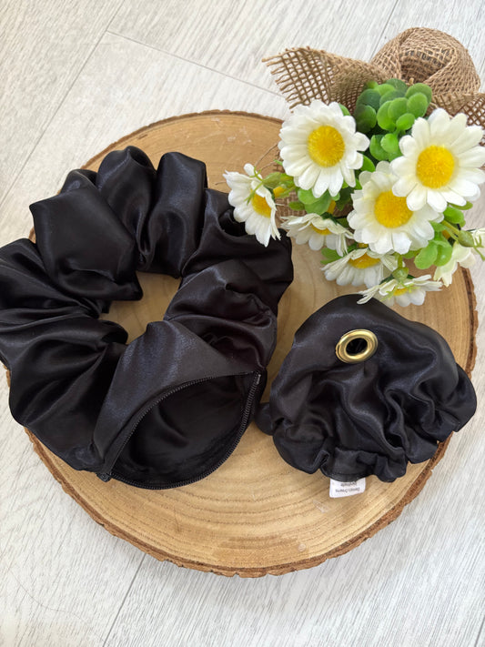 Large scrunchie with secret zipper and glass covering.