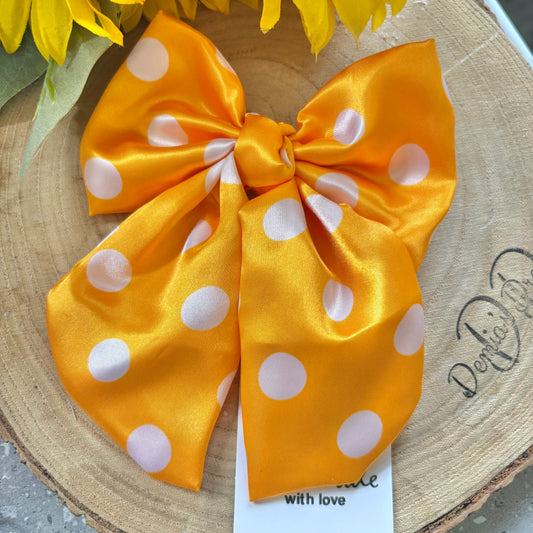Polka dots orange handmade hair bow