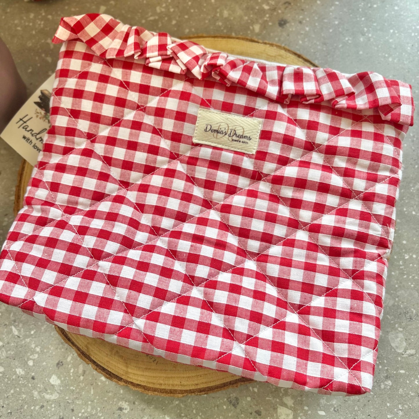 Red gingham toiletry bag with ruffle