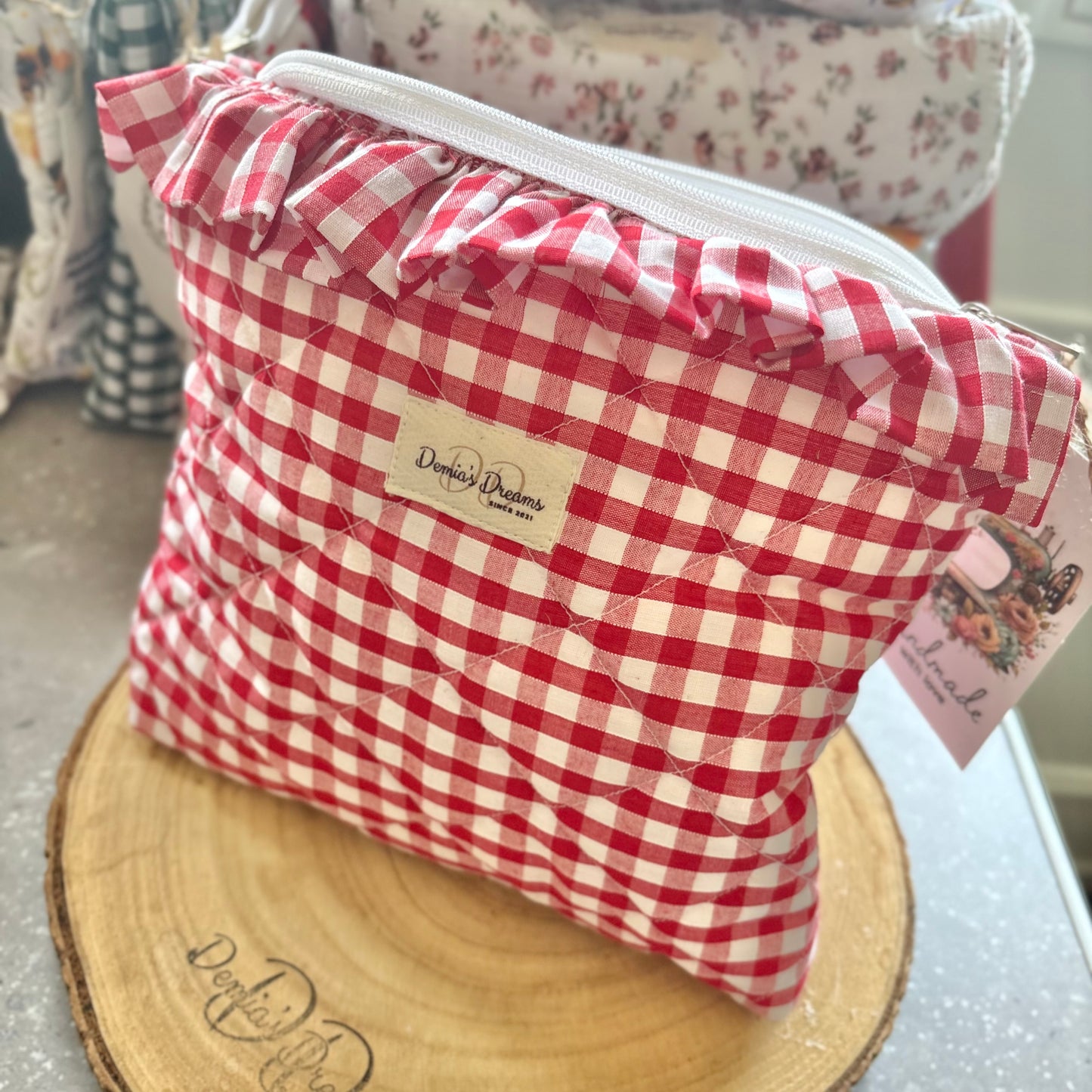 Red gingham toiletry bag with ruffle