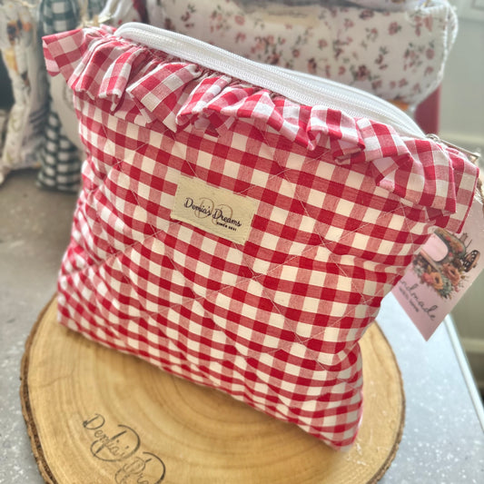 Red gingham toiletry bag with ruffle